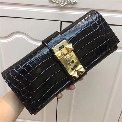 black hermes clutch|hermes clutch price.